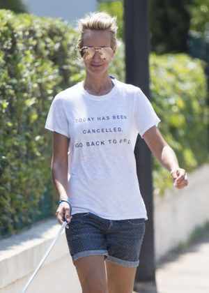 Lady Victoria Hervey in Shorts with Her Dog in Antibes